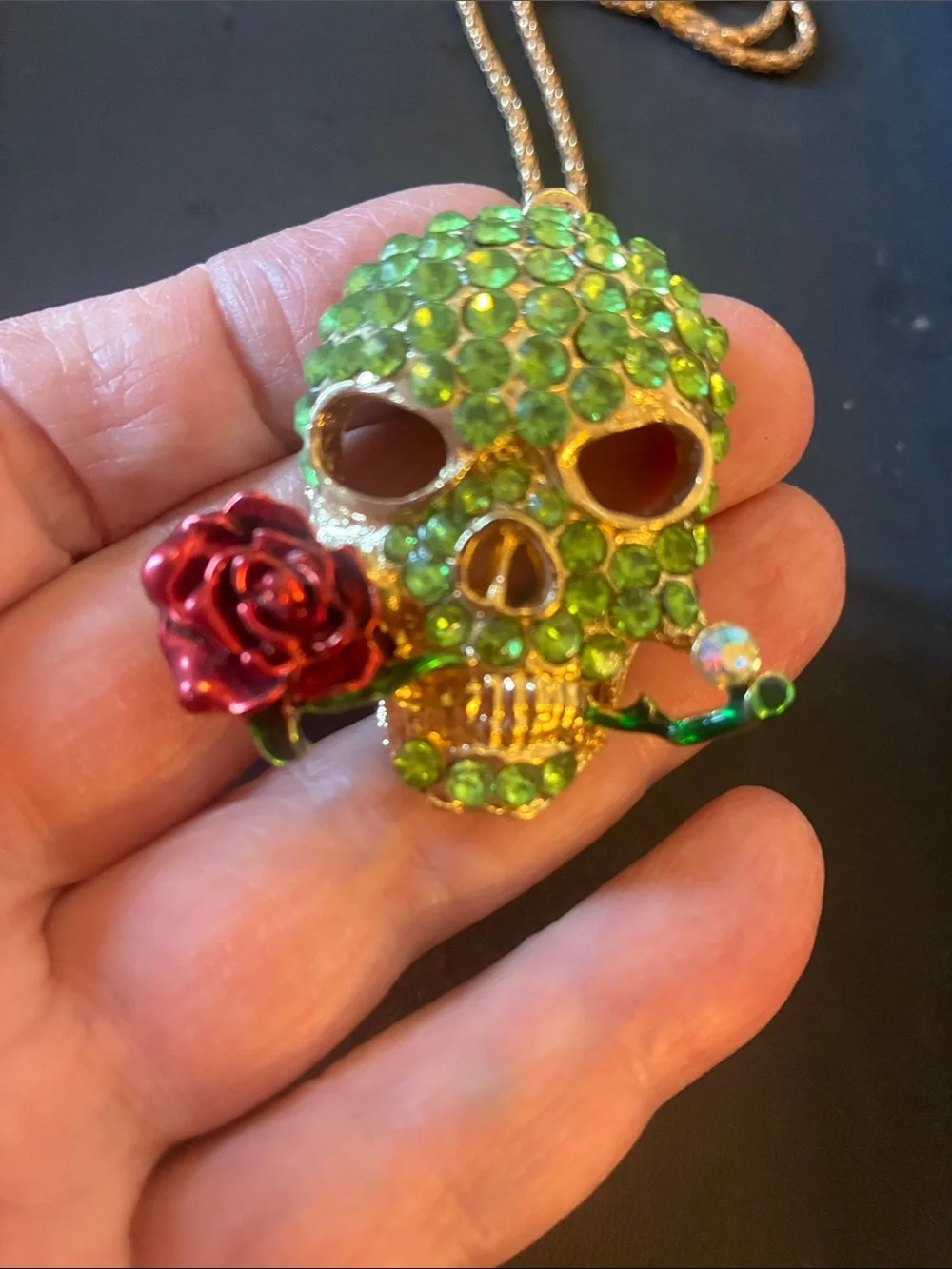 Green Crystal Skull Pendant Necklace with Red Rose Accent